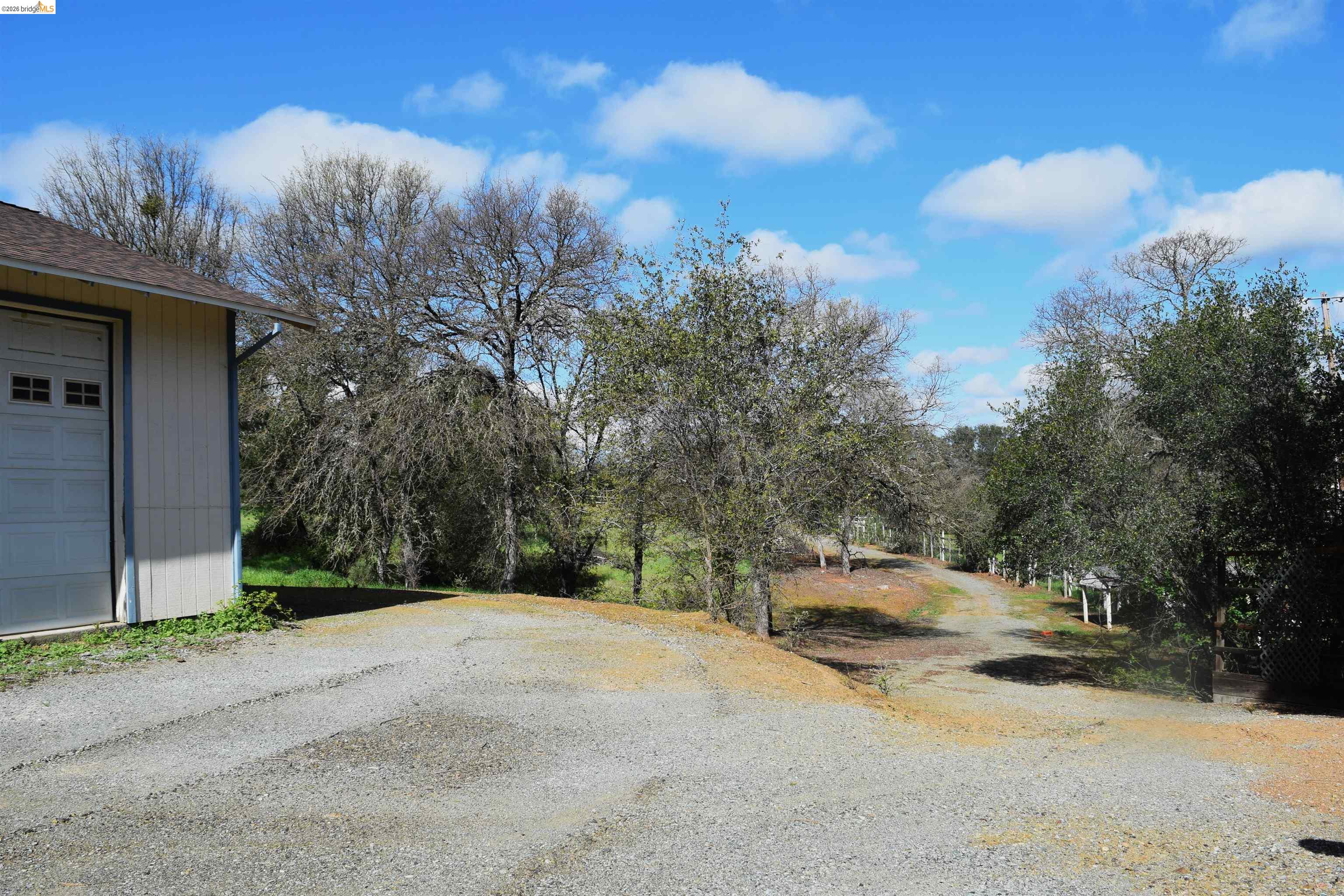 913 Quill Road Copperopolis, CA 95228 - Photo 6 of 55 a view of the house with a street