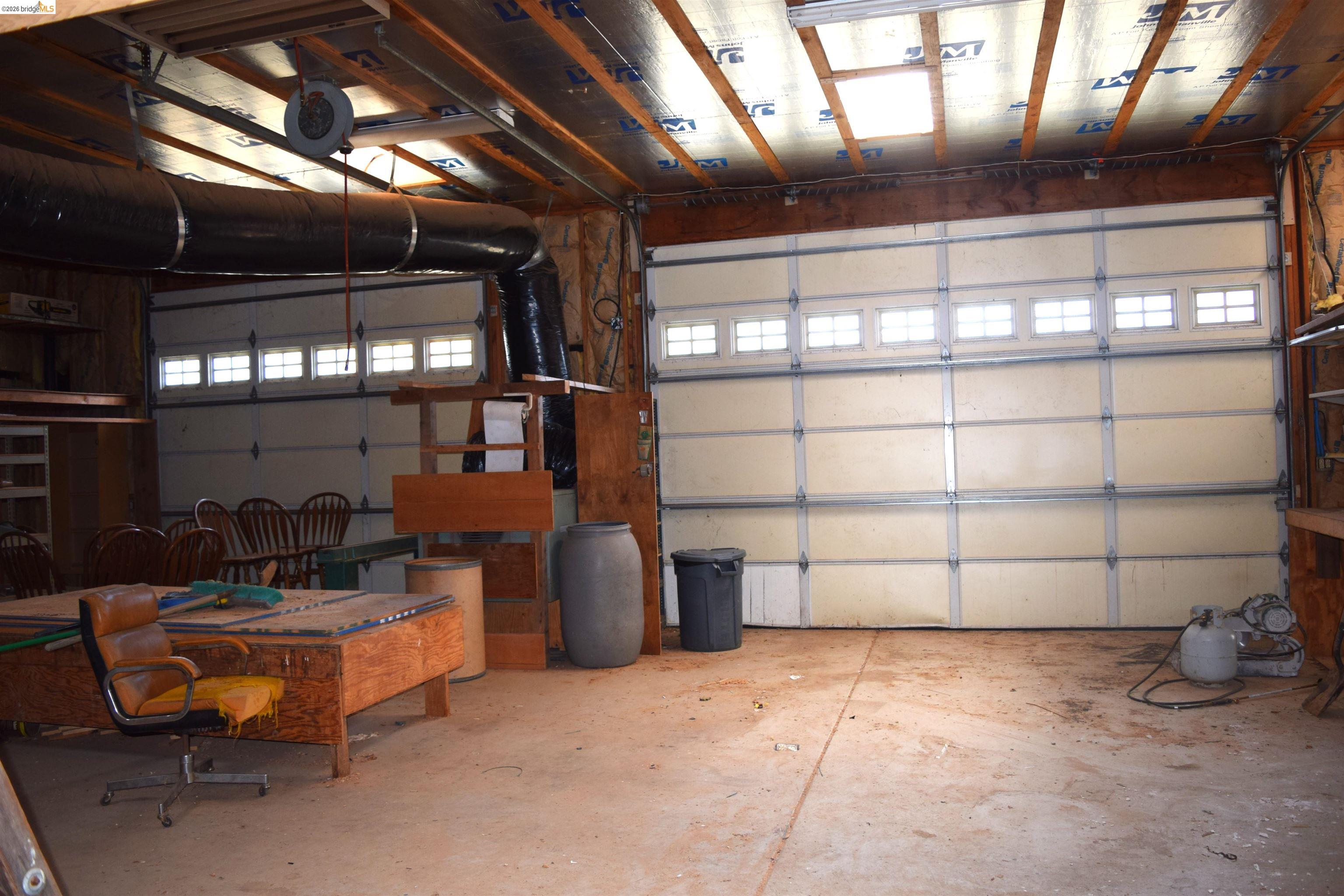 913 Quill Road Copperopolis, CA 95228 - Photo 9 of 55 a view of a room with gym equipment