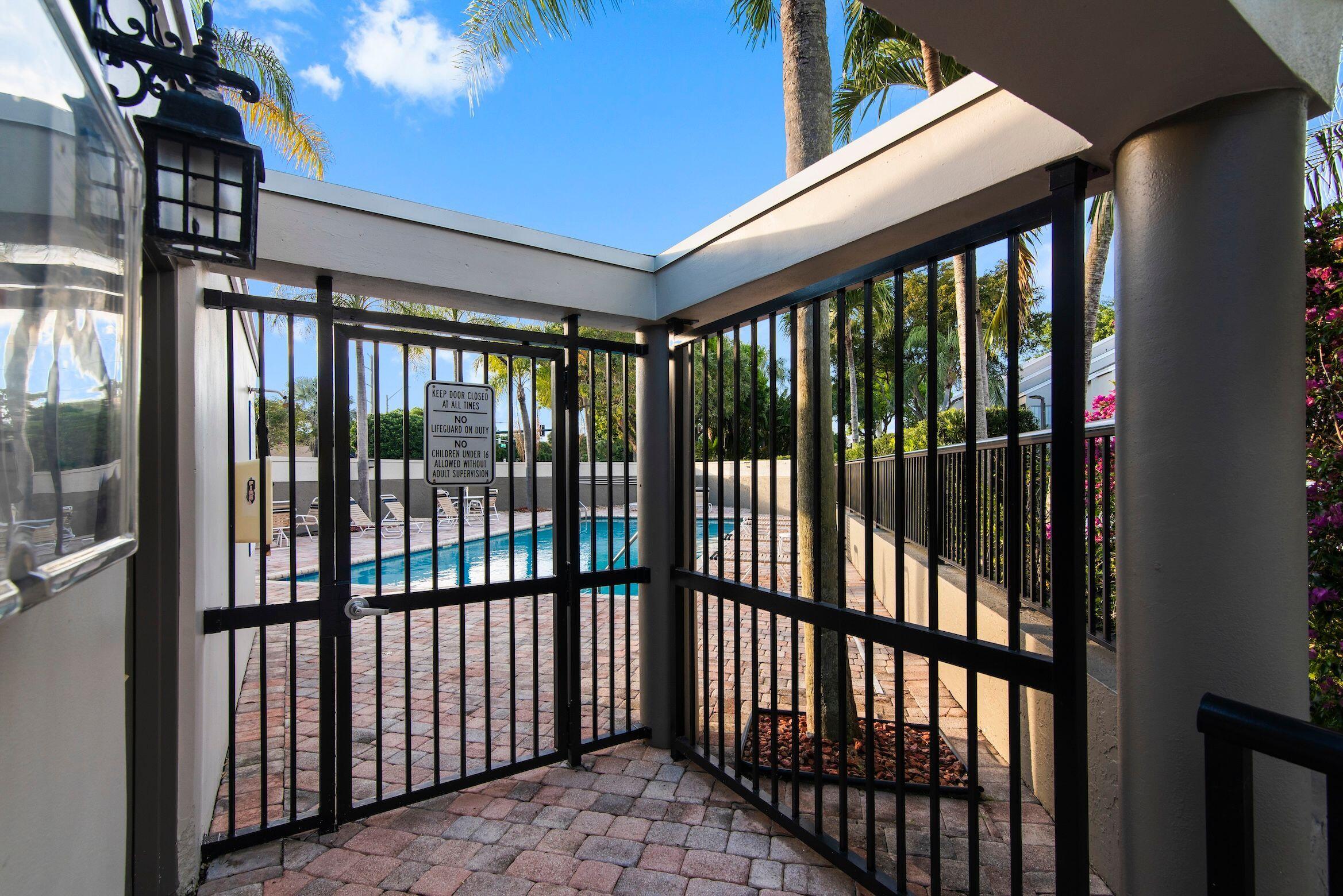 6773 Boca Pines Trail, Unit D Boca Raton, FL 33433 - Photo 46 of 47 Entrance to community pool