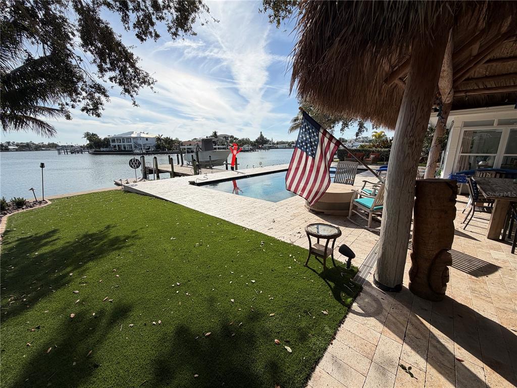 433 20th Avenue Indian Rocks Beach, FL 33785 - Photo 11 of 23 a view of a backyard with sitting area