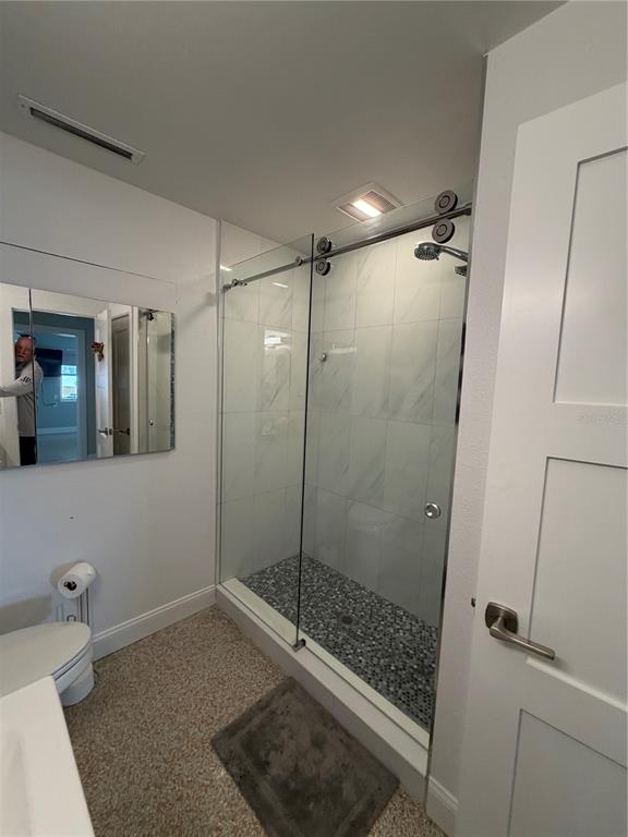 433 20th Avenue Indian Rocks Beach, FL 33785 - Photo 12 of 23 a bathroom with a shower