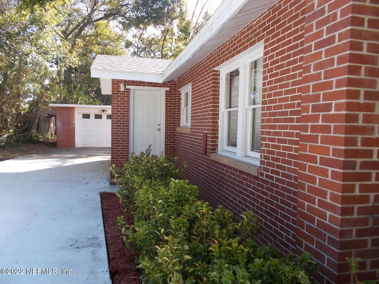 5738 Cruz Road Jacksonville, FL 32207 - Photo 3 of 22 Rear Door to Garage