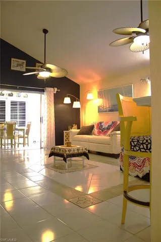 a bedroom with double bed and window