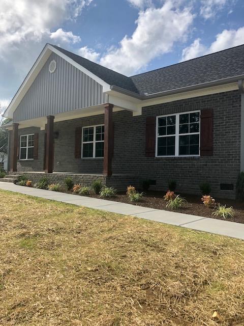 353 Lear Road Portland, TN 37148 - Photo 3 of 14 a front view of a house with a yard