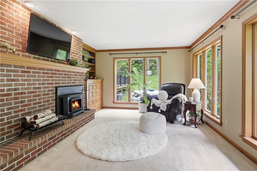 920 Willis Hill Road Victor, NY 14564 - Photo 20 of 42 Living room with fireplace.