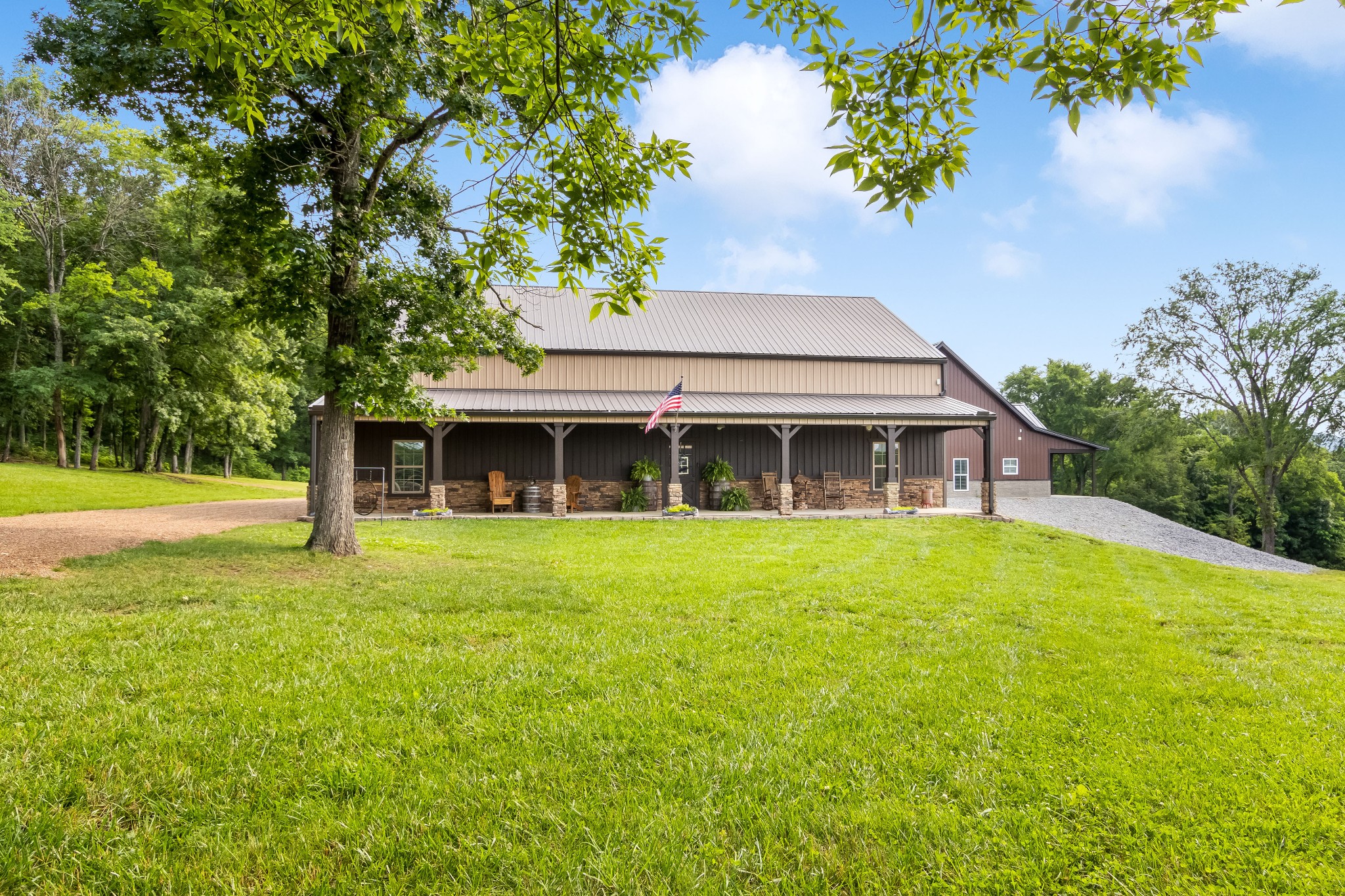 1049 Oregon Road Lascassas, TN 37085 - Photo 3 of 99 a front view of a house with a garden