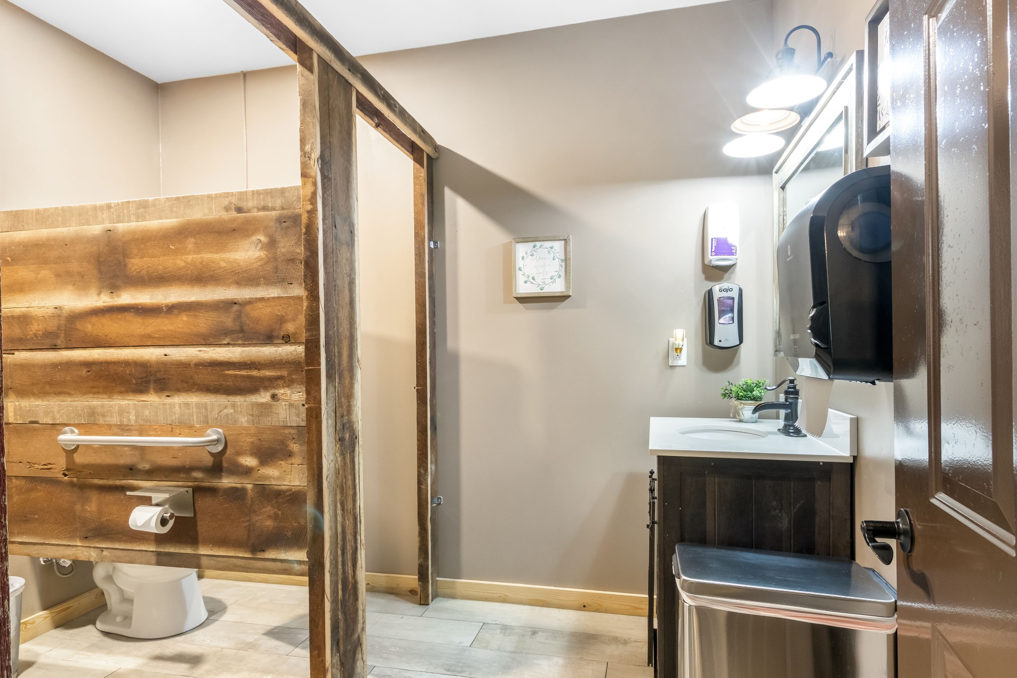 1049 Oregon Road Lascassas, TN 37085 - Photo 69 of 99 a bathroom with a sink and a mirror