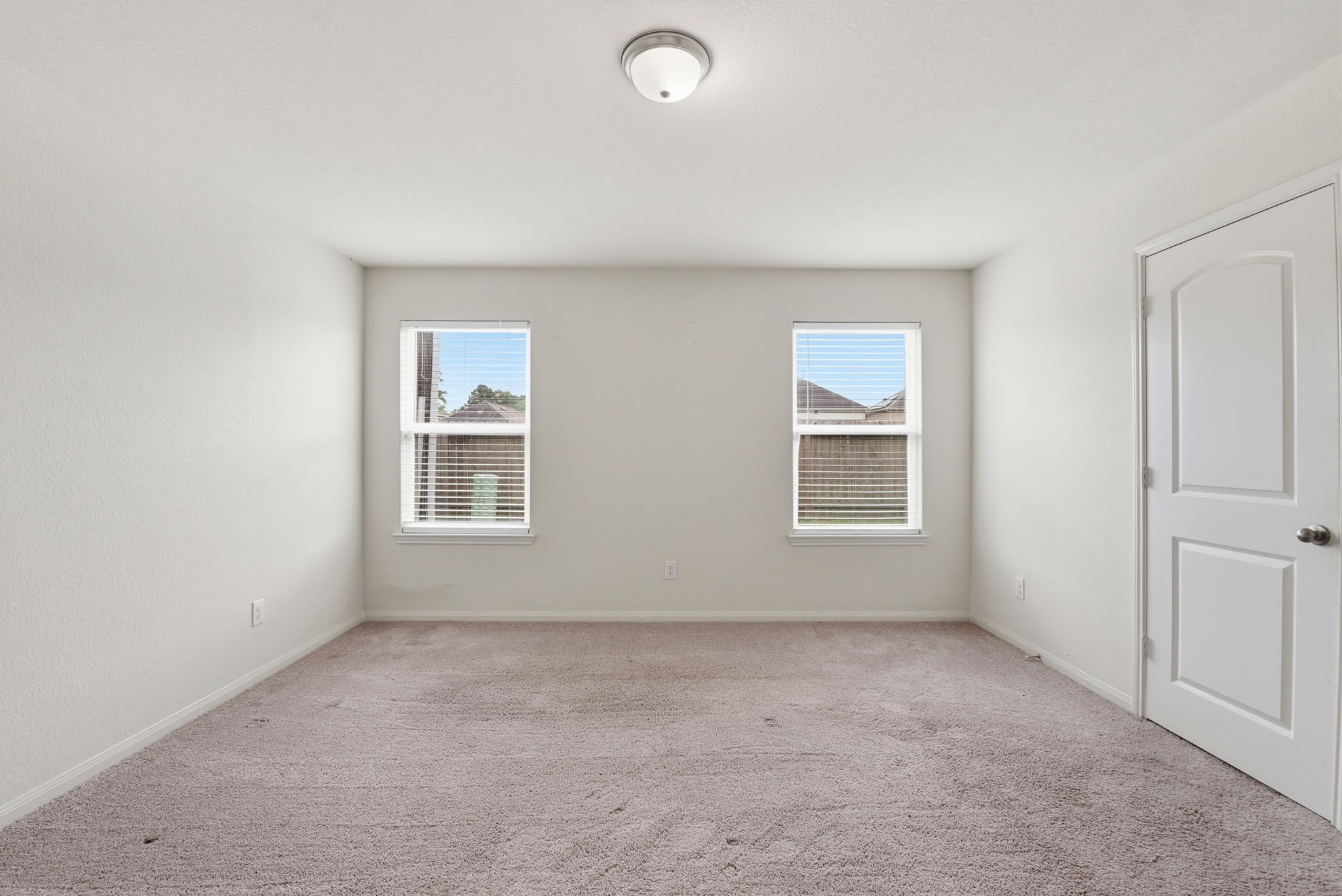 10802 Spring Brook Pass Drive Humble, TX 77396 - Photo 15 of 22 Primary Bedroom.