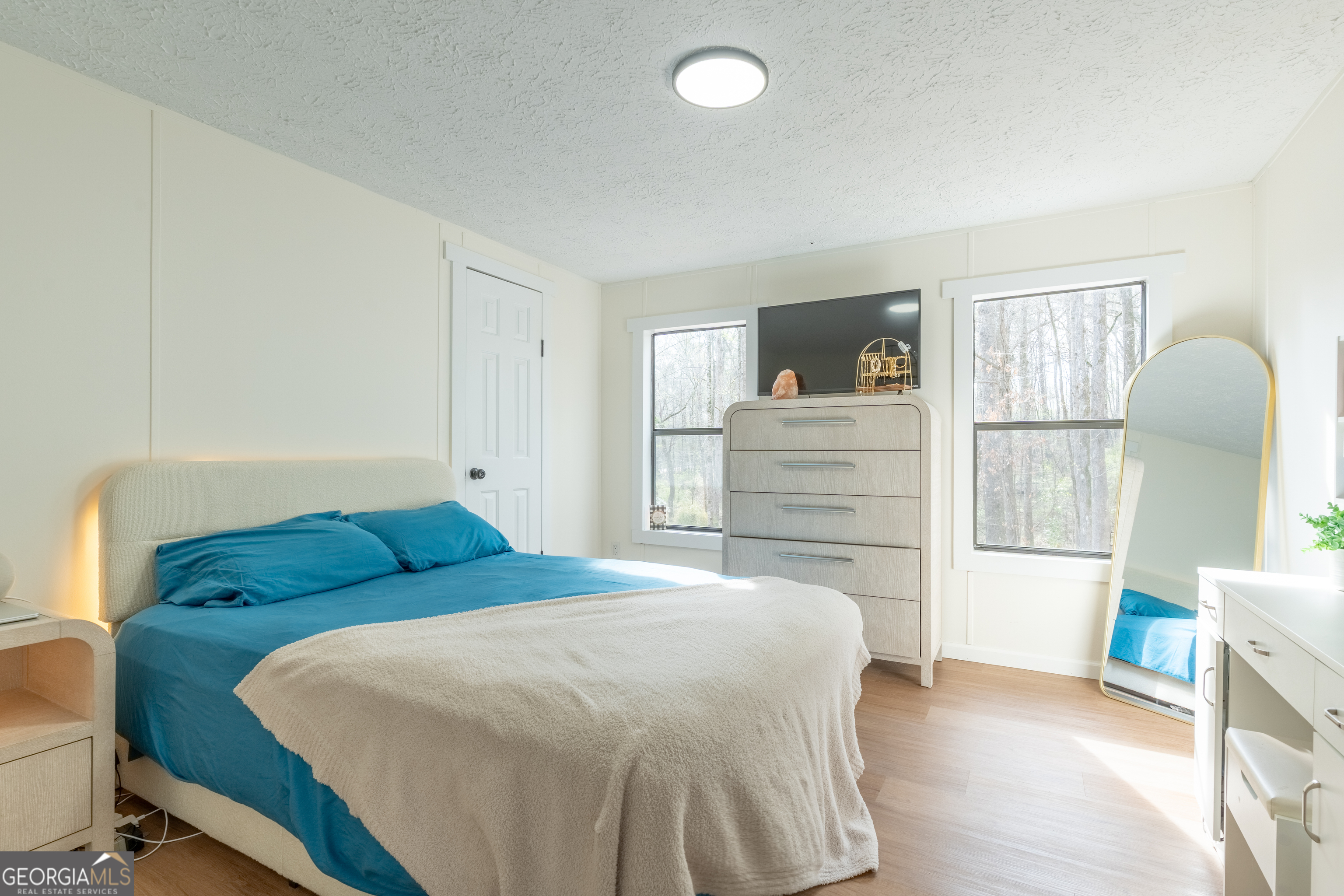 452 Aikenton Road Monticello, GA 31064 - Photo 26 of 47 a bedroom with a bed and a window
