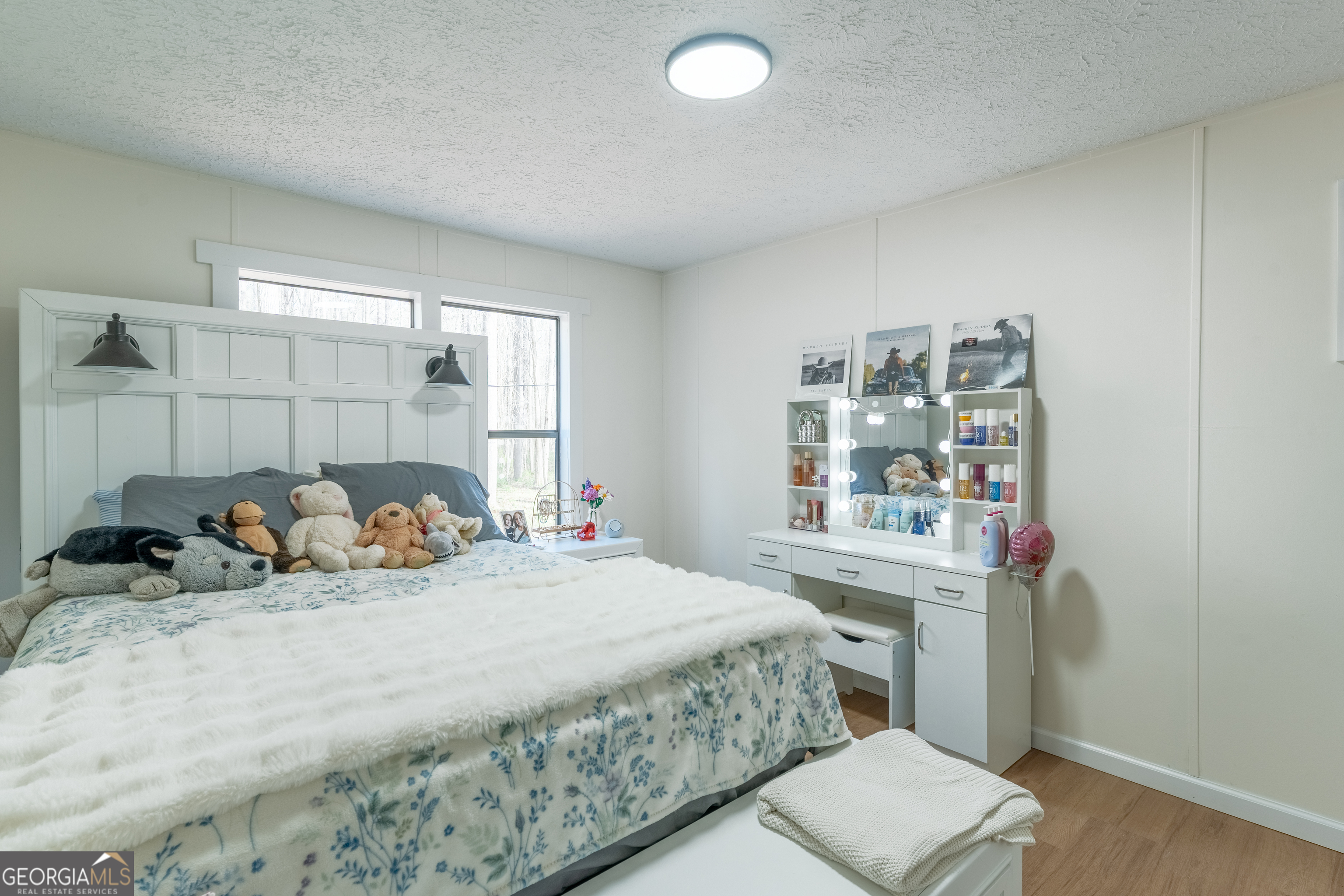 452 Aikenton Road Monticello, GA 31064 - Photo 28 of 47 a bedroom with a bed and a window