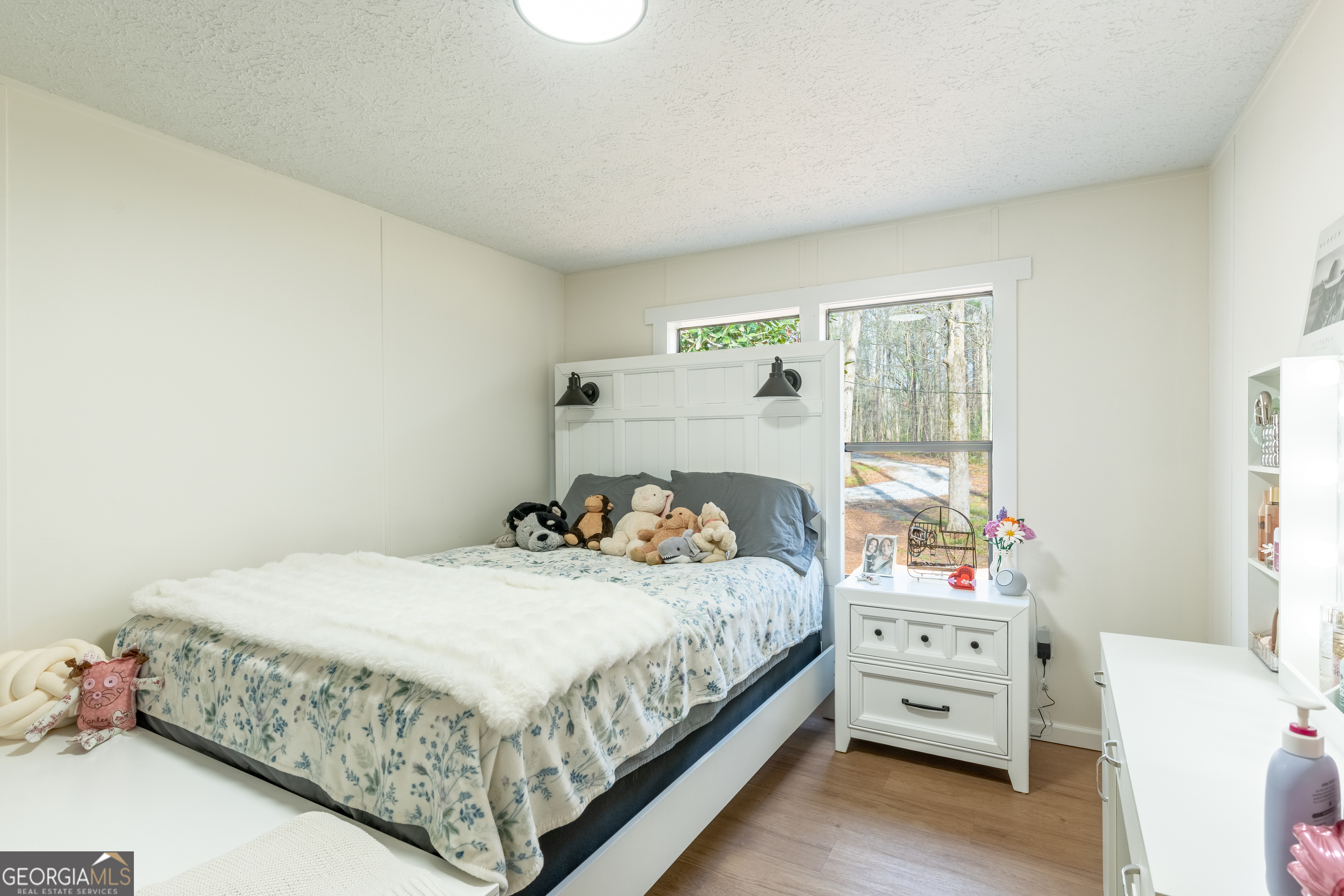452 Aikenton Road Monticello, GA 31064 - Photo 29 of 47 a bedroom with a bed and a window