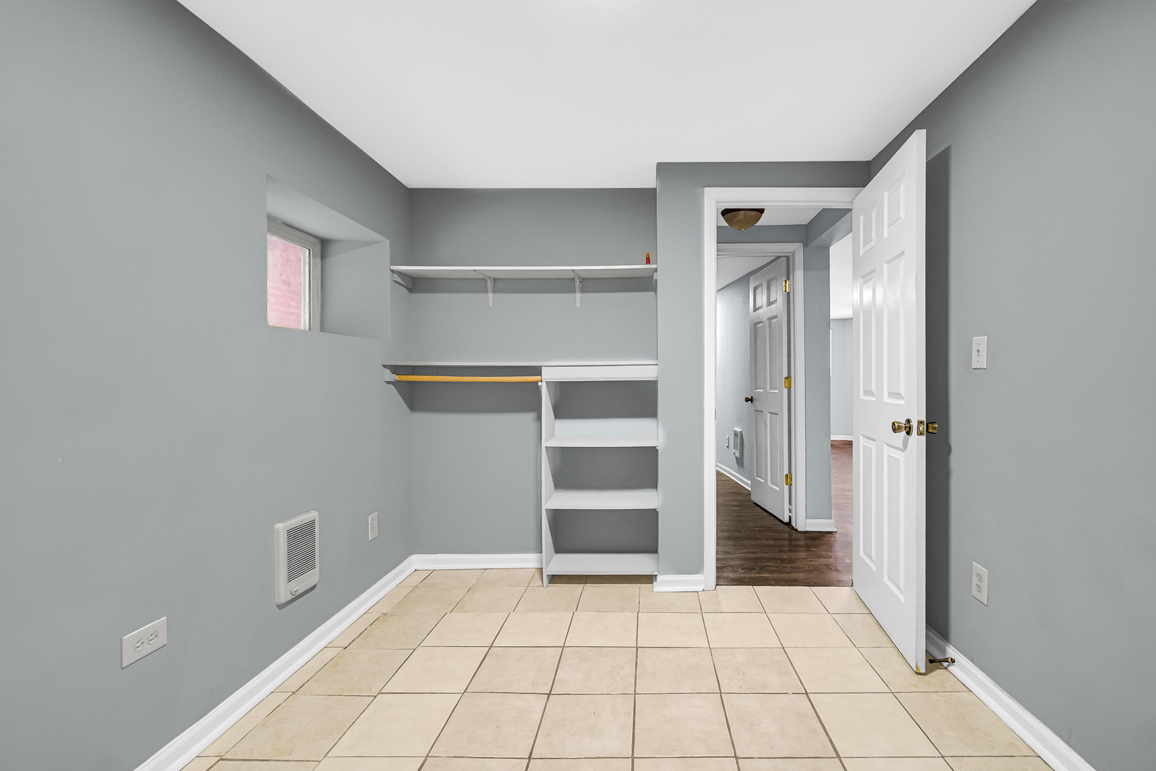 5540 South Honore Street Chicago, IL 60636 - Photo 13 of 23 a view of an empty room and window