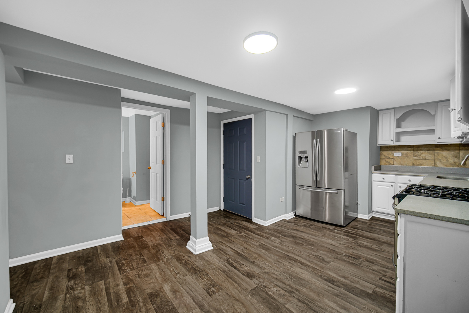5540 South Honore Street Chicago, IL 60636 - Photo 18 of 23 a view of a kitchen with wooden floor