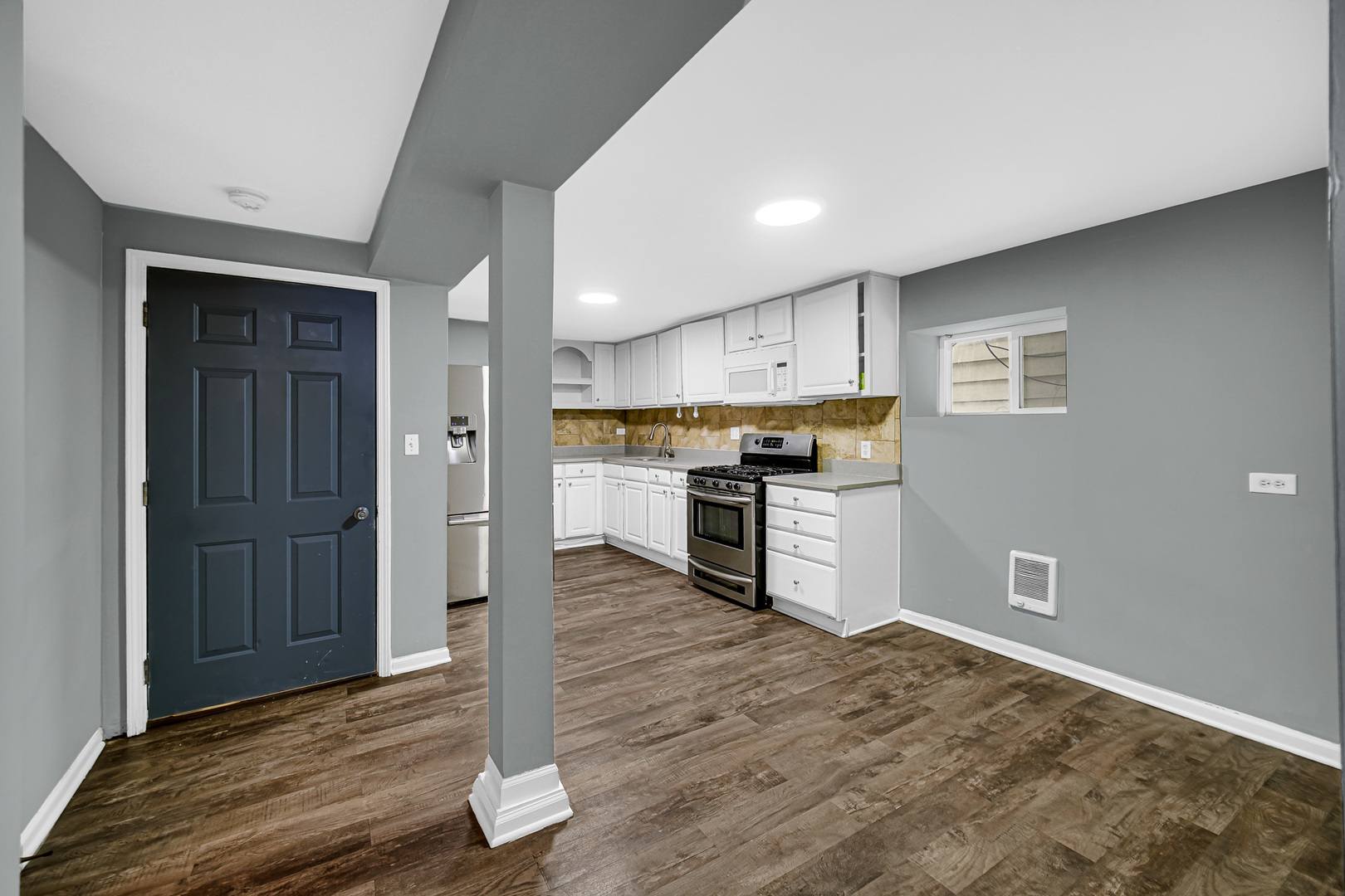 5540 South Honore Street Chicago, IL 60636 - Photo 19 of 23 a view of kitchen with wooden floor