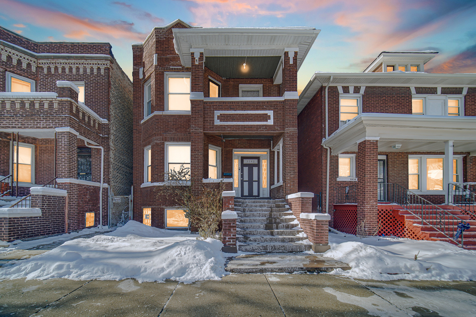 5540 South Honore Street Chicago, IL 60636 - Photo 2 of 23 a view of a building with a lot of windows