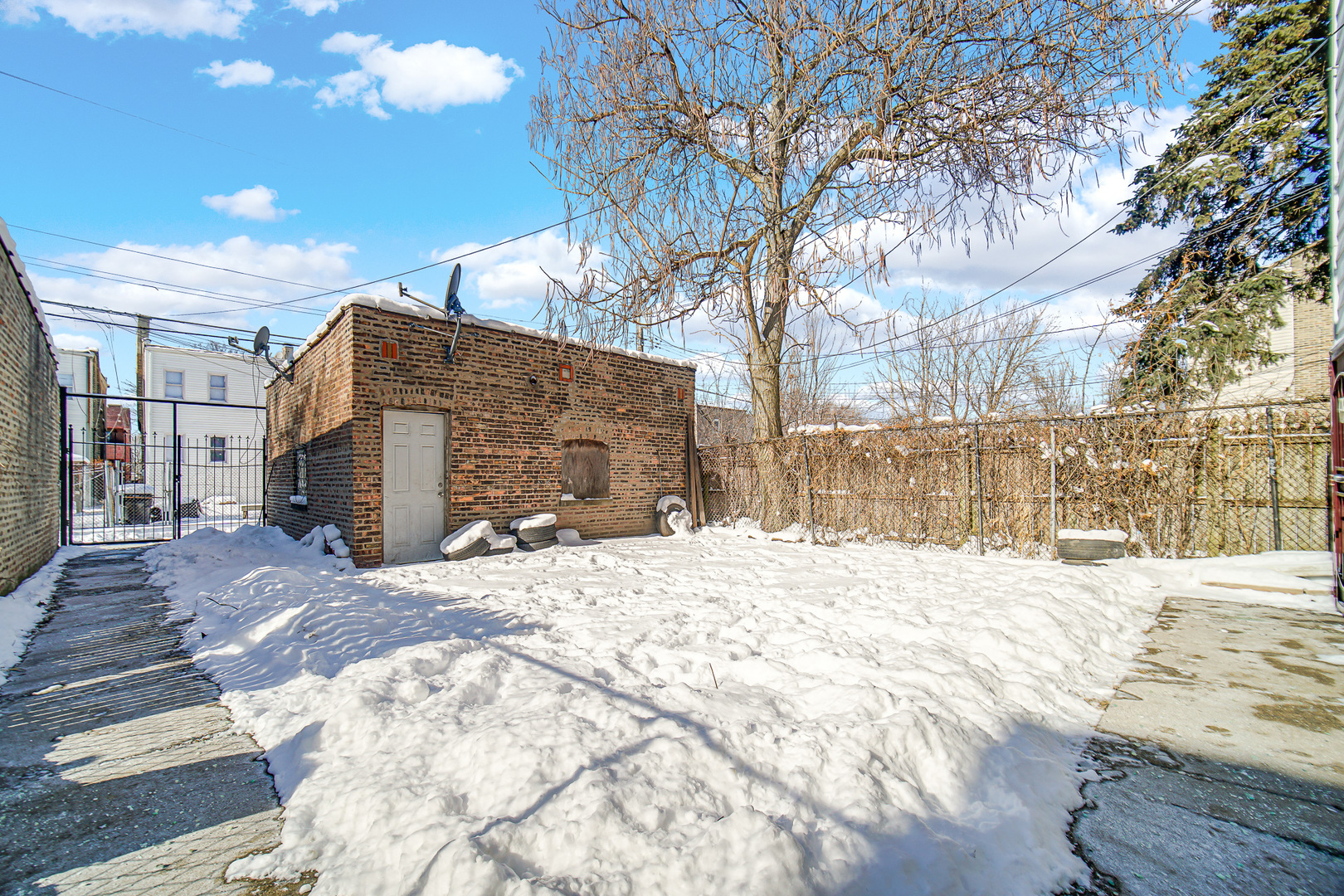 5540 South Honore Street Chicago, IL 60636 - Photo 22 of 23 a street view covered with snow