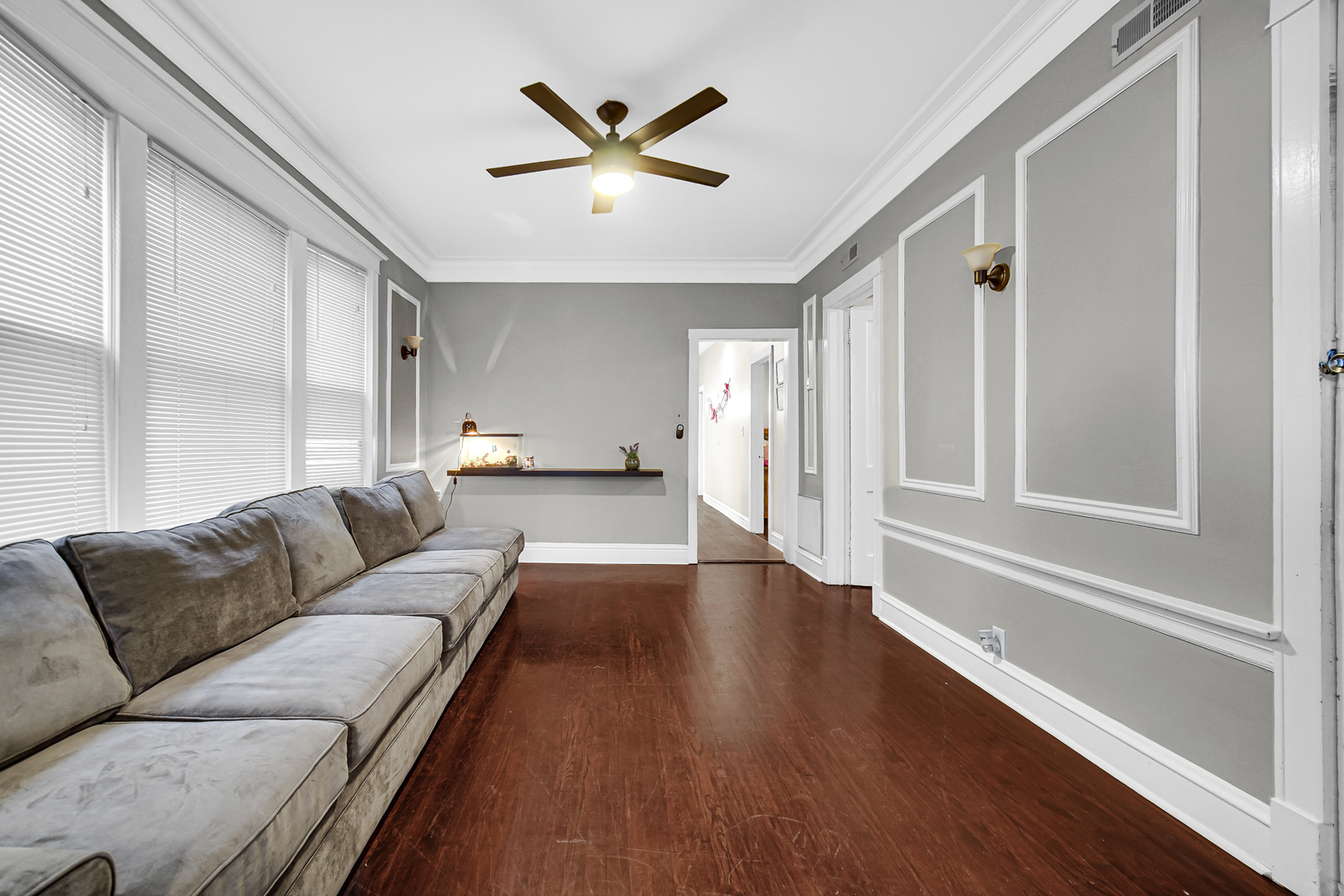 5540 South Honore Street Chicago, IL 60636 - Photo 8 of 23 a living room with furniture and a large window