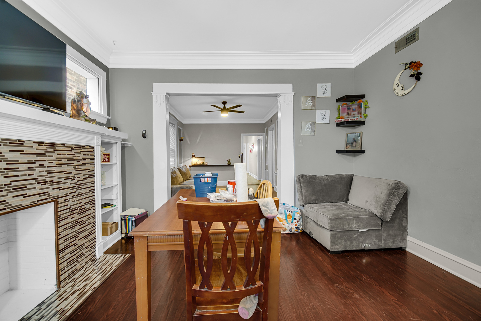 5540 South Honore Street Chicago, IL 60636 - Photo 9 of 23 a living room with furniture and a flat screen tv