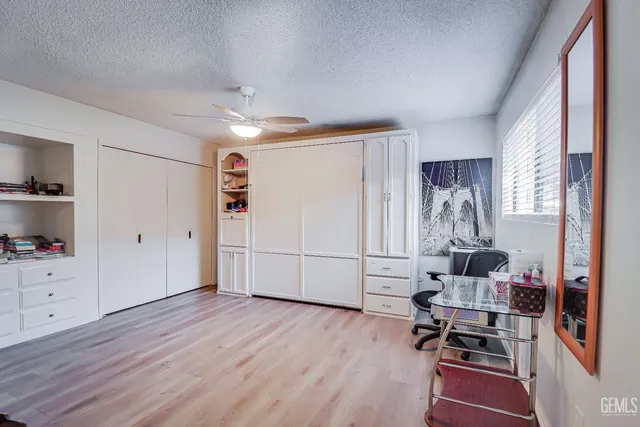 a room with furniture and wooden floor
