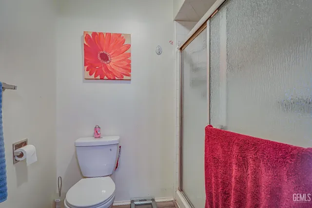 a bathroom with a toilet and a sink
