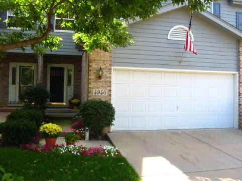 4940 Riedy Place, Unit 4940 Lisle, IL 60532 - Photo 1 of 1 a house view with a garden space
