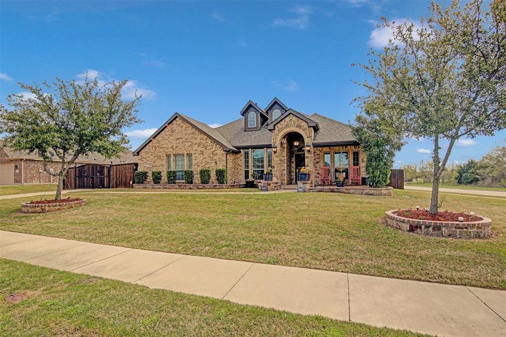 1224 Daventry Drive Glenn Heights, TX 75154 - Photo 1 of 1 a front view of a house with a yard