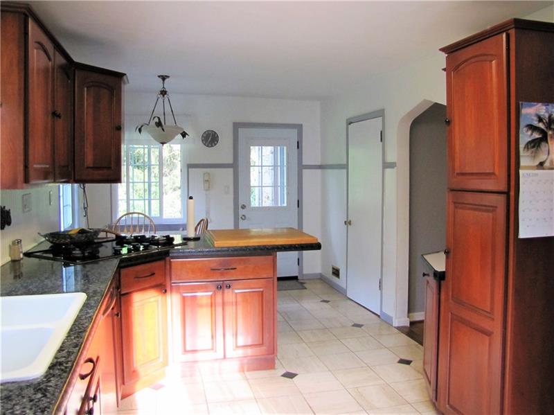 1940 Wallace Road Allison Park, PA 15101 - Photo 4 of 21 CHERRY KITCHEN CABINETS