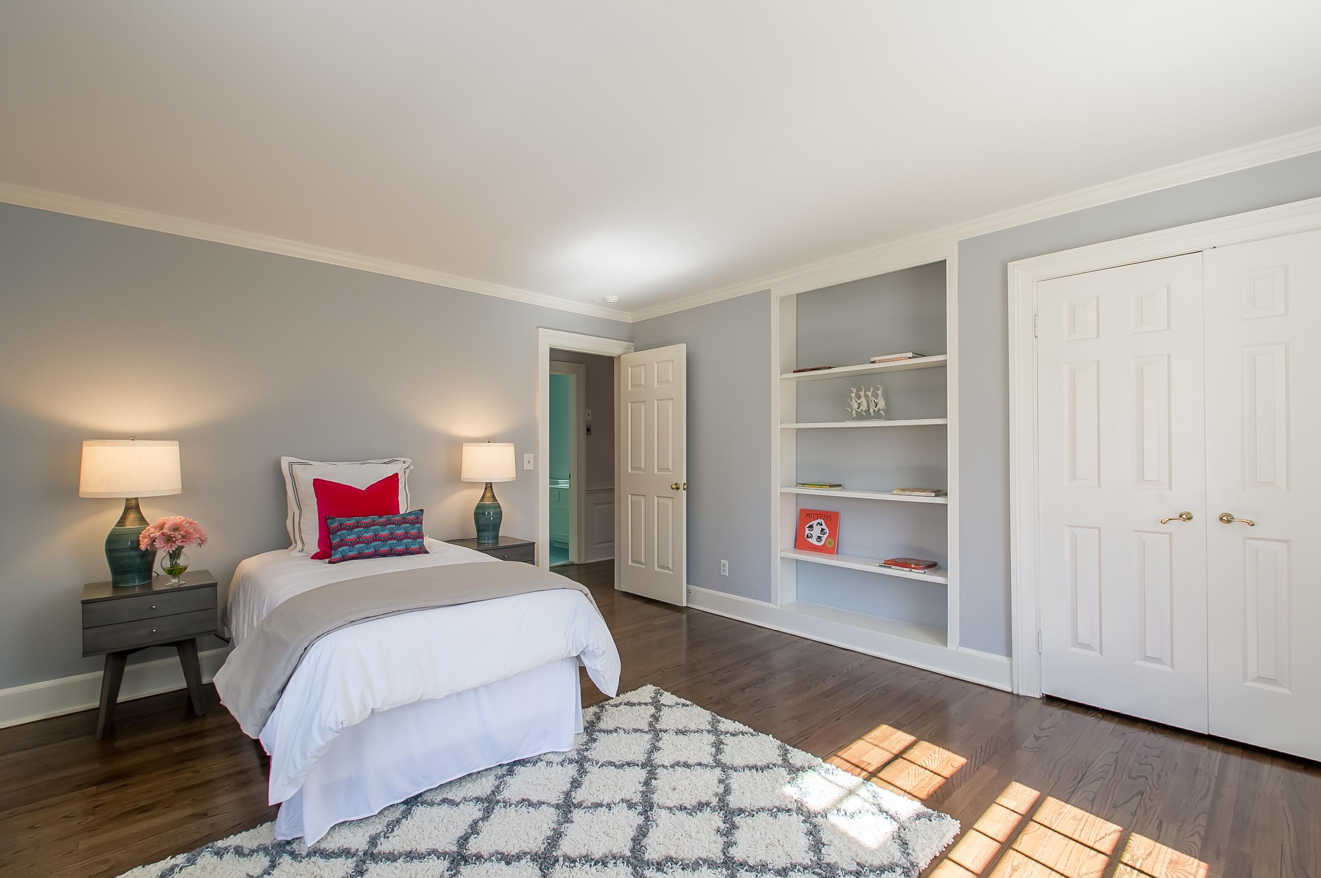 Undisclosed Address Wilton, CT 06897 - Photo 26 of 30 a bedroom with a bed and a window