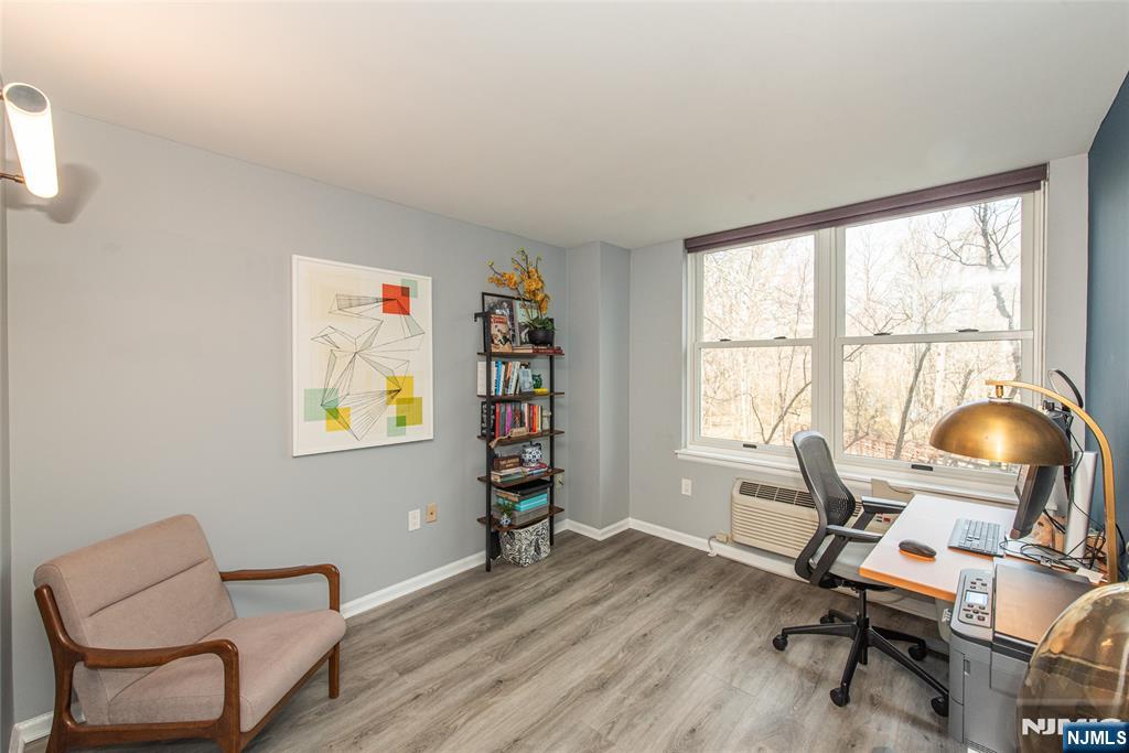 300 Main Street, Unit 211 Little Falls, NJ 07424 - Photo 23 of 30 a workspace with furniture and a window
