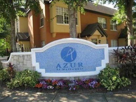6312 Raleigh Street, Unit 503 Orlando, FL 32835 - Photo 1 of 1 a front view of a house with garden