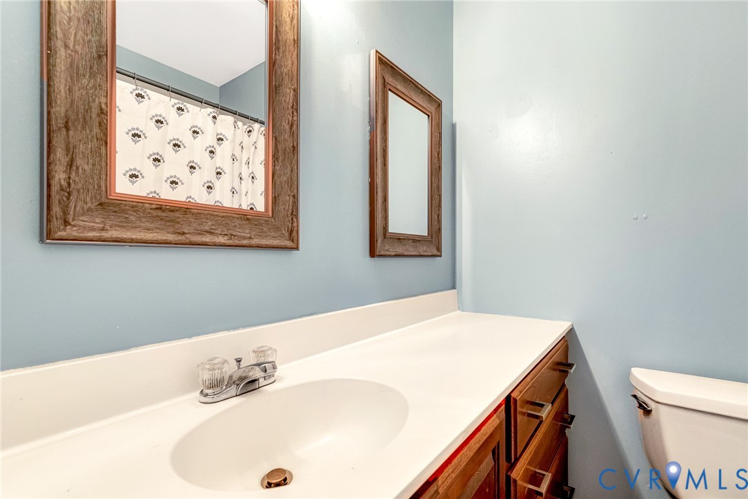 14050 West Patrick Henry Road Doswell, VA 23047 - Photo 34 of 38 Upstairs hall bathroom with a tub shower combinati