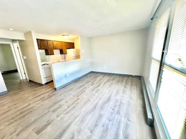 618 Union Street California, PA 15419 - Photo 2 of 10 a view of a room with wooden floor and windows