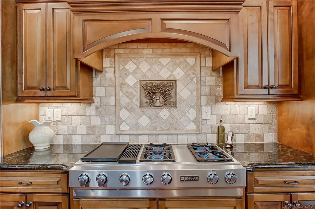 556 Medora Lane Fort Mill, SC 29708 - Photo 12 of 47 a stove top oven sitting inside of a kitchen