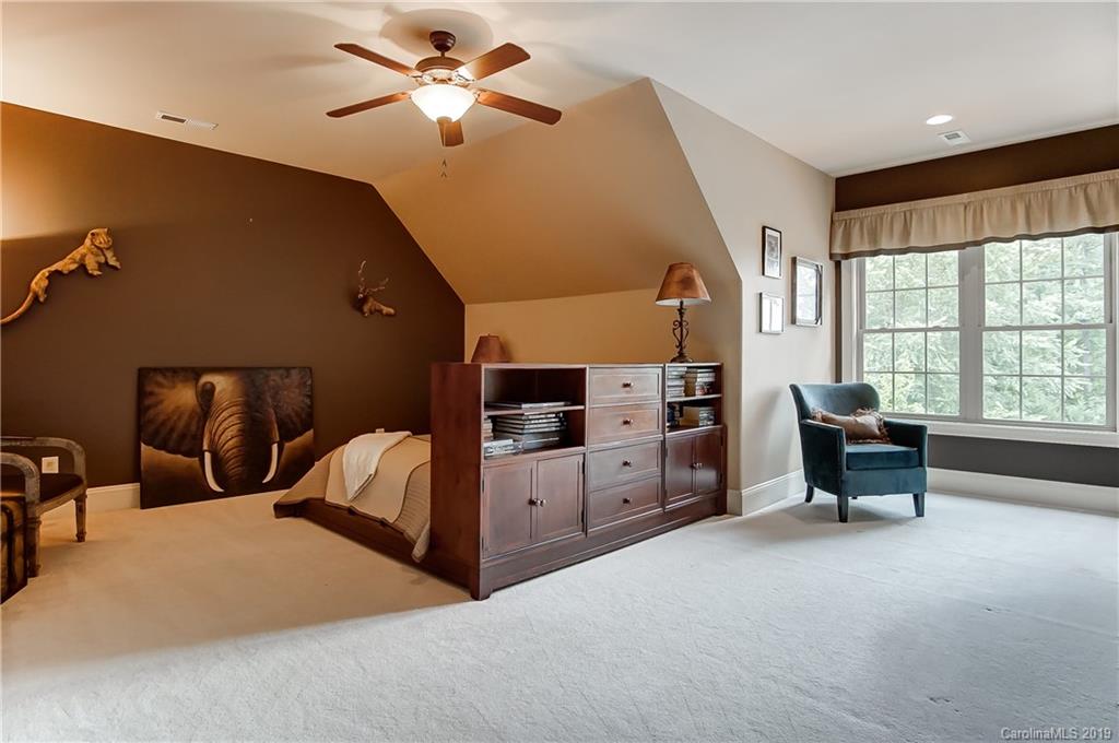 556 Medora Lane Fort Mill, SC 29708 - Photo 23 of 47 a bedroom with furniture and window