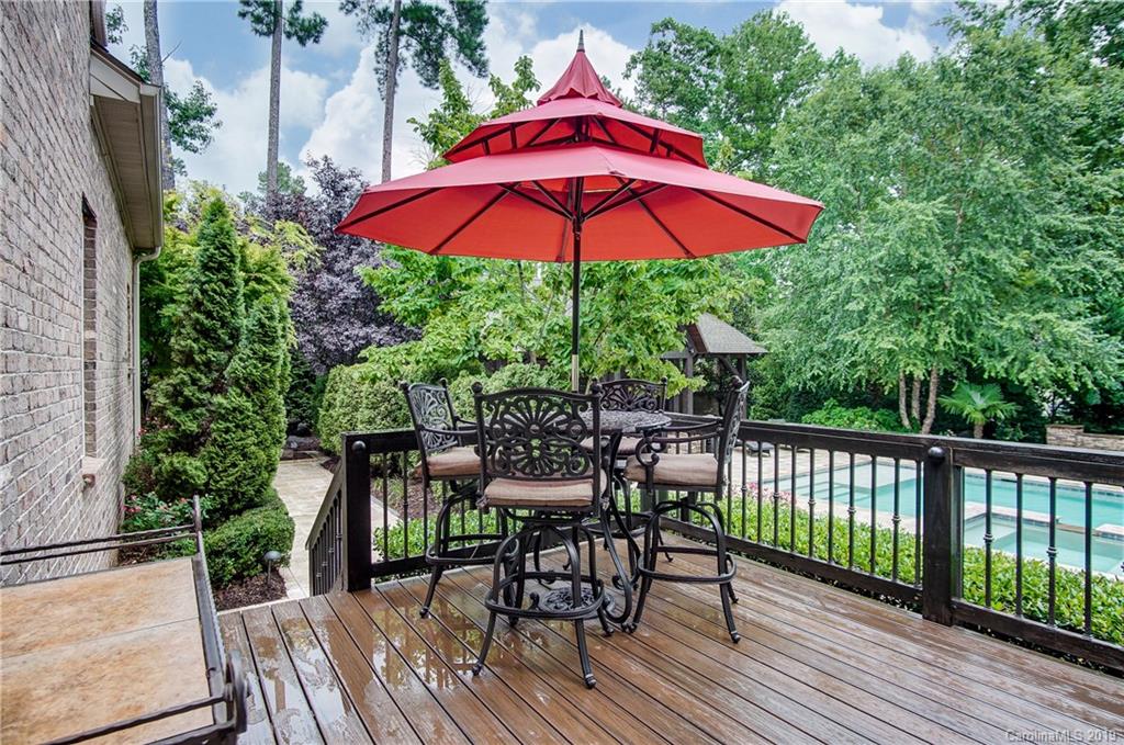 556 Medora Lane Fort Mill, SC 29708 - Photo 24 of 47 a view of balcony with wooden floor and outdoor seating