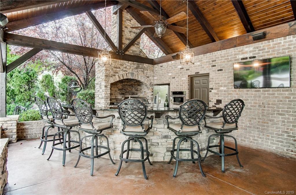 556 Medora Lane Fort Mill, SC 29708 - Photo 31 of 47 a group of people sitting in patio