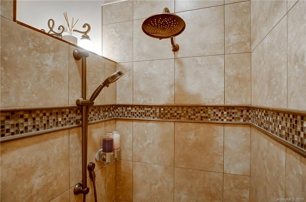 556 Medora Lane Fort Mill, SC 29708 - Photo 38 of 47 a bathroom with a shower and a table