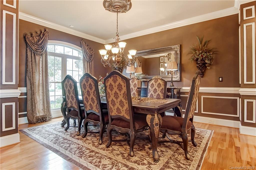556 Medora Lane Fort Mill, SC 29708 - Photo 7 of 47 a view of a dining room with furniture window and wooden floor