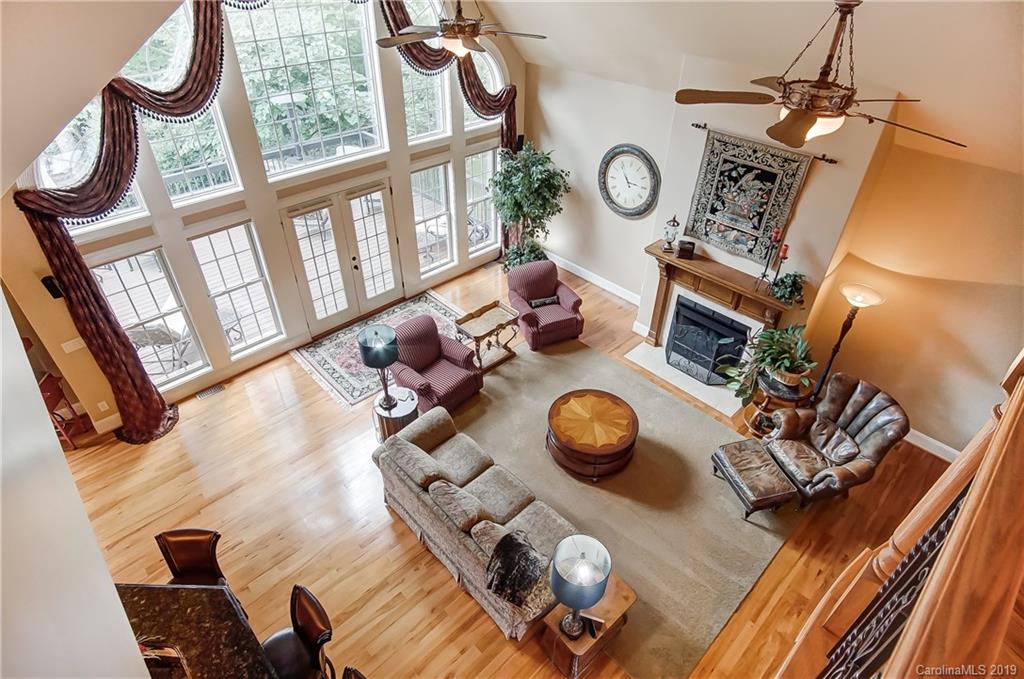 556 Medora Lane Fort Mill, SC 29708 - Photo 9 of 47 a view of living room with furniture and a wooden floor