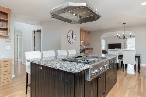 a kitchen with a counter space cabinets and stainless steel appliances