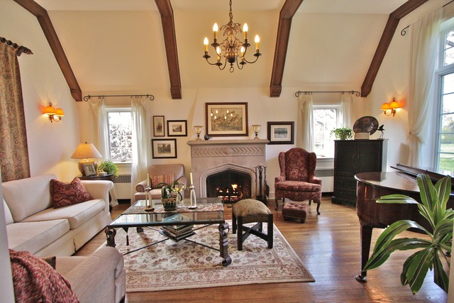 6350 North Indian Road Chicago, IL 60646 - Photo 2 of 23 a living room with furniture a large window and a fireplace