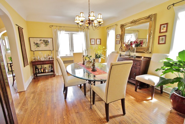 6350 North Indian Road Chicago, IL 60646 - Photo 4 of 23 a view of a dining room with furniture window and wooden floor
