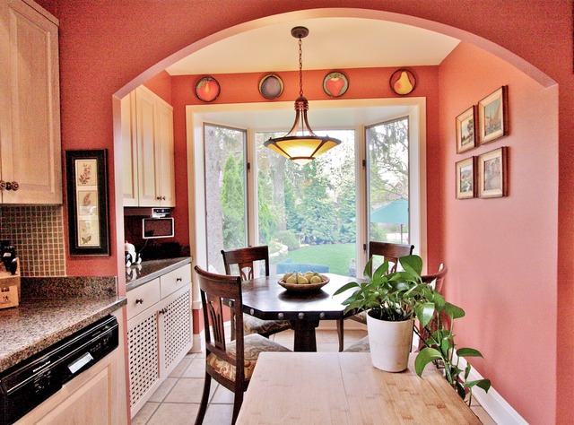 6350 North Indian Road Chicago, IL 60646 - Photo 7 of 23 a kitchen with a table and chairs in it