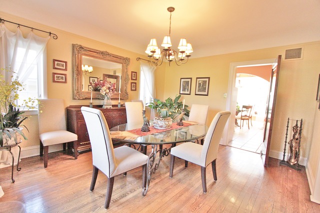 6350 North Indian Road Chicago, IL 60646 - Photo 8 of 23 a view of a dining room with furniture window and wooden floor