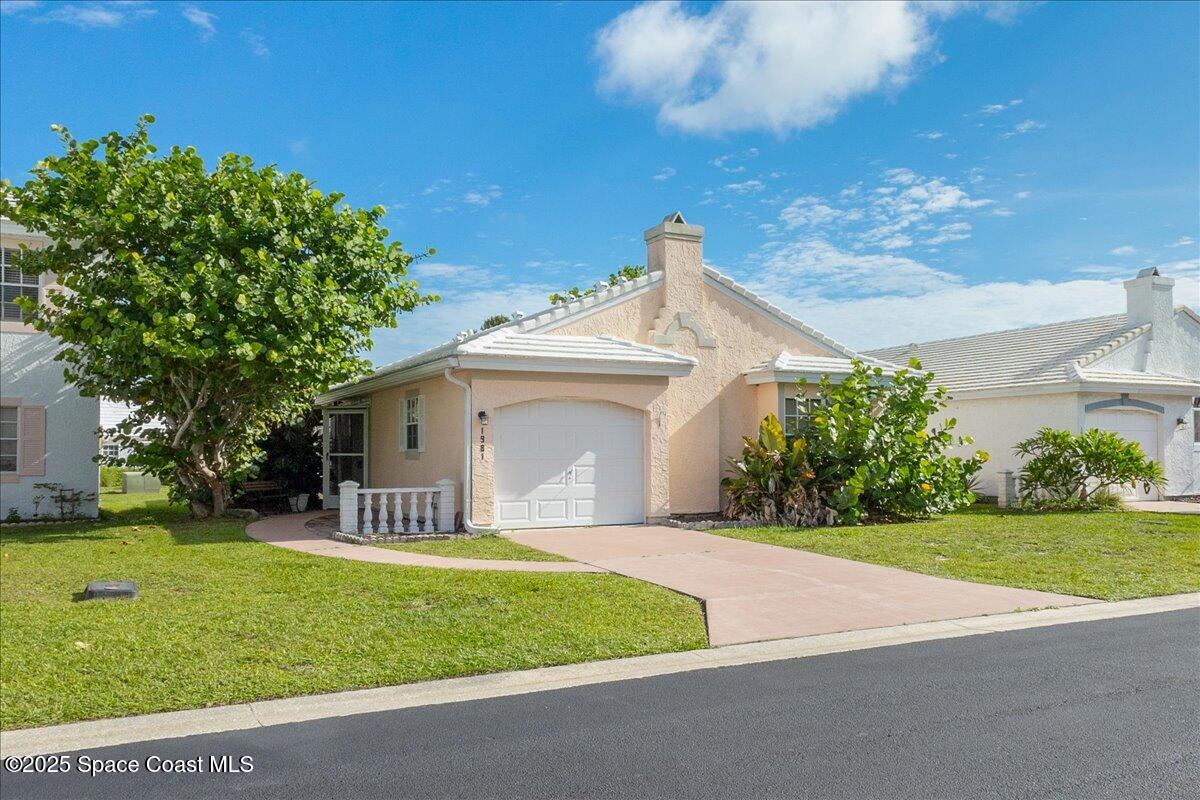 1981 Tallowood Court Northeast Palm Bay, FL 32905 - Photo 2 of 37 02-1981-Tallowood-101