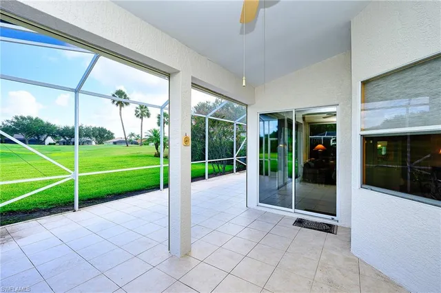 a view of a room with window and a yard