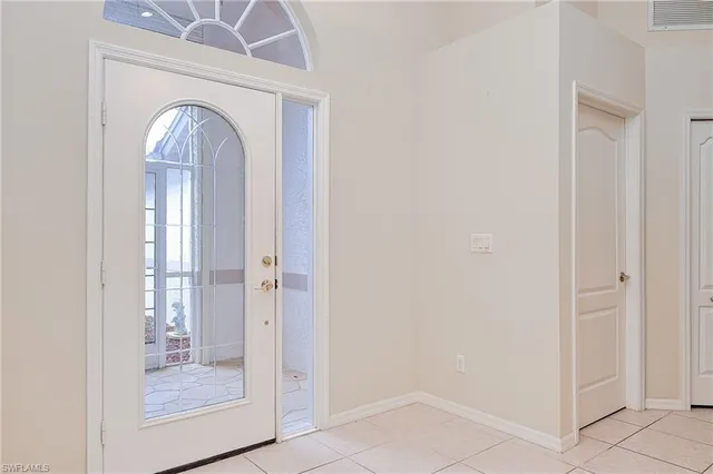 a view of a livingroom from a hallway