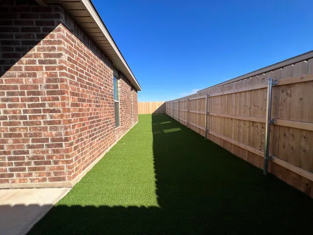 a view of an outdoor space and a yard