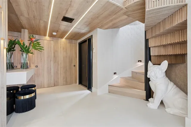 a view of entryway with a white walls