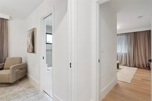 an aerial view of residential building with green space